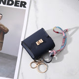 Mini Bolso Llavero Muñequera