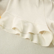 Conjunto camisola shorts hoja bordada