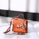 Mini Bolso Llavero Muñequera